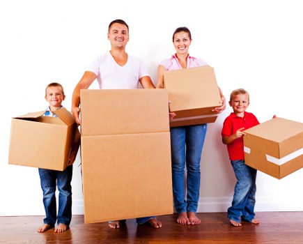 House removal team helping a family move in Ilford