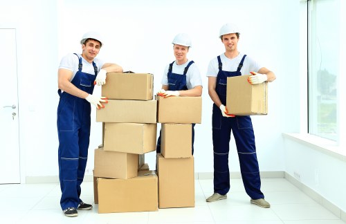 Removal team supporting a home move in Ilford with boxes and furniture