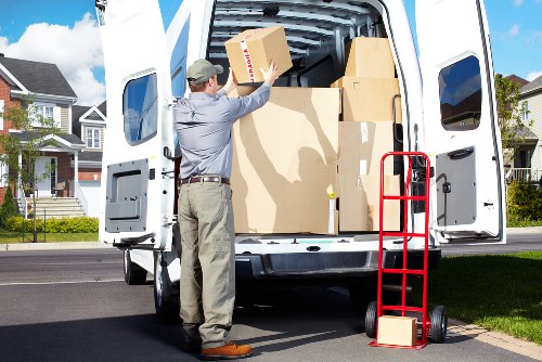 Professional Ilford movers organizing household items for transport
