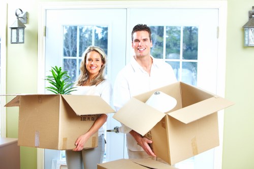 Professional packing and protective wrapping for fragile items before moving day