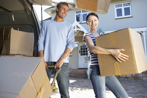 Local removals team loading a van for a move in Ilford with careful organisation