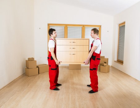 Removalists planning a local move in Ilford with boxes and equipment